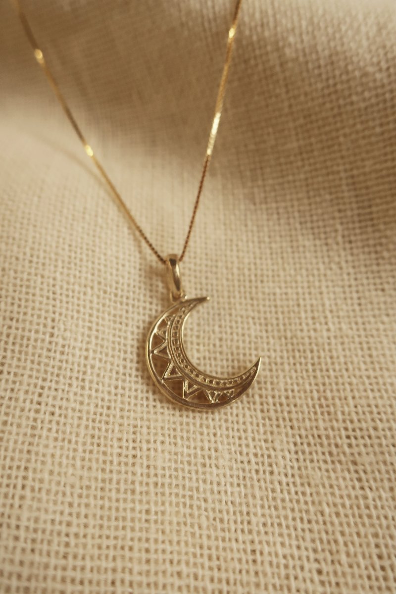 Gold Cut Out Crescent Moon Charm Necklace by All About Audrey