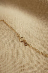 Gold Cut Out Crescent Moon Charm Necklace by All About Audrey