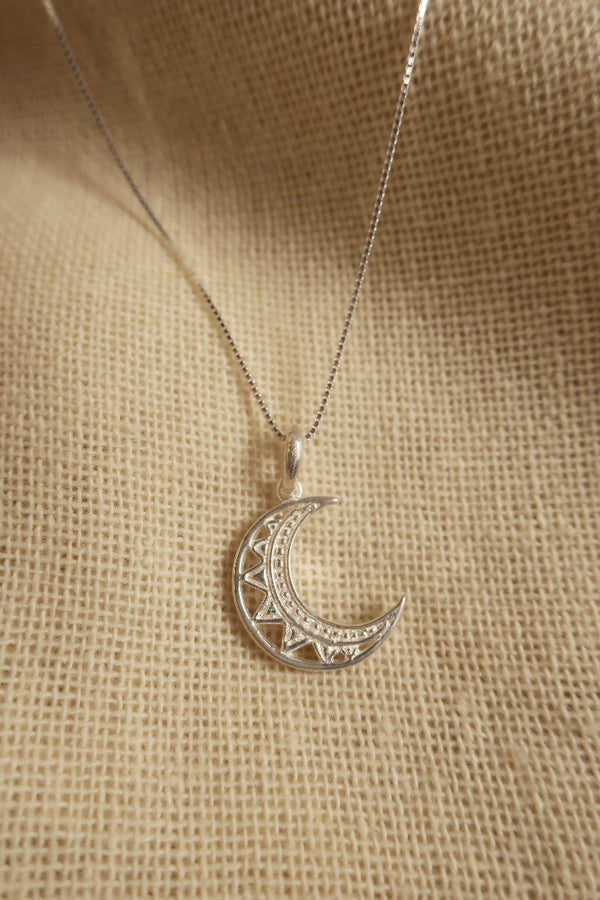 Silver Cut Out Crescent Moon Charm Necklace by All About Audrey