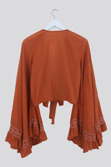 Pisces Crochet Wrap Top in Bergamot Orange by All About Audrey