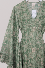 Venus Folklore Floral Mini Wrap Dress in Bamboo Green by All About Audrey