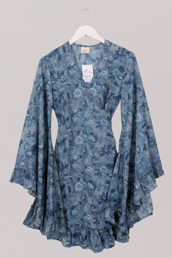 Venus Folklore Floral Mini Wrap Dress in Forget Me Not Blue by All About Audrey