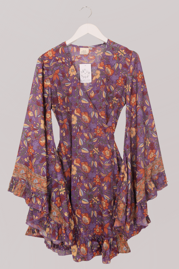 Venus Folklore Floral Mini Wrap Dress in Hibiscus Purple by All About Audrey