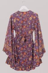 Venus Folklore Floral Mini Wrap Dress in Hibiscus Purple by All About Audrey