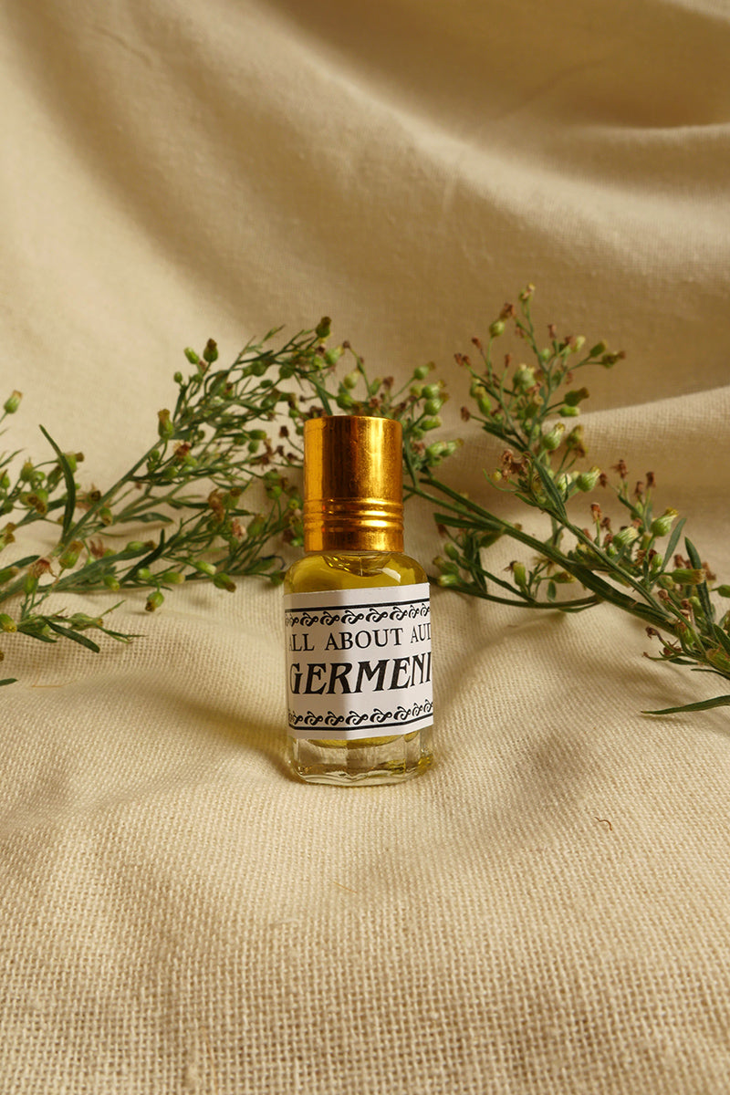 Geranium Essential Oil Perfume, a small glass bottle with a vintage style metal screw top. By All About Audrey