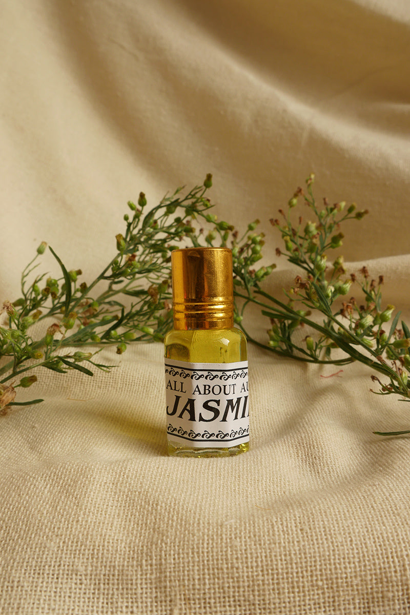 Jasmine Essential Oil Perfume, a small glass bottle with a vintage style metal screw top. By All About Audrey