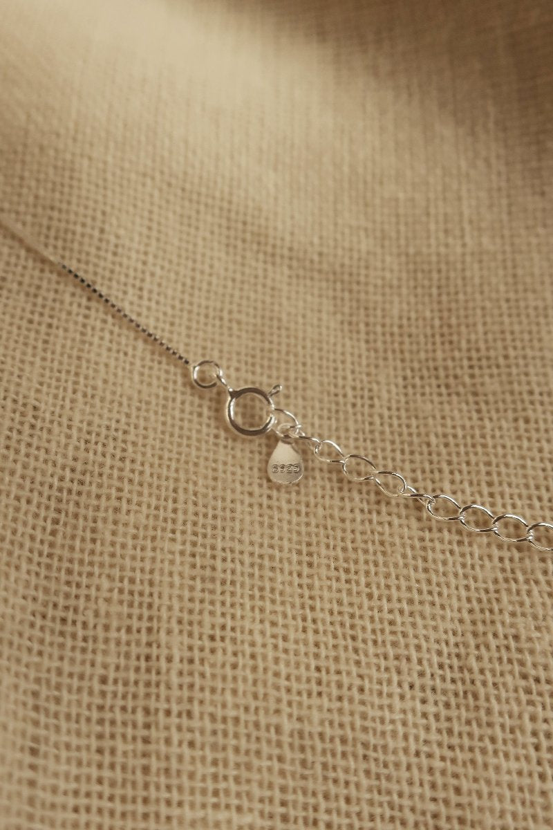 Silver Lovers Rose Charm Necklace by All About Audrey